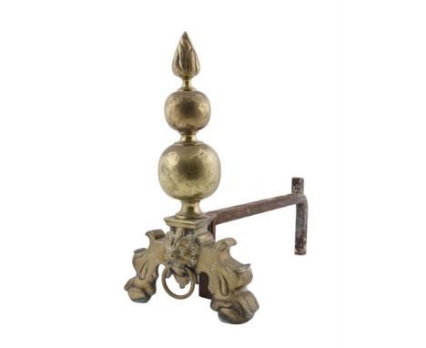 A PAIR OF DUTCH BRASS ANDIRONS, 19th century, each with flambeau finial above graduated spheres, lion mask with pendant ring 
