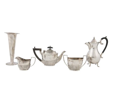 A SILVER THREE-PIECE BACHELOR'S TEA SERVICE, Birmingham 1915, mark of George Nathan & Ridley Hayes, comprising teapot, sugar 