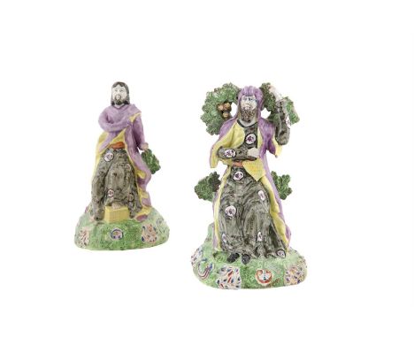 A PAIR OF STAFFORDSHIRE PEARLWARE FIGURES, c.1820 attributed to Walton, each against a coloured bocage, holding tablet panels