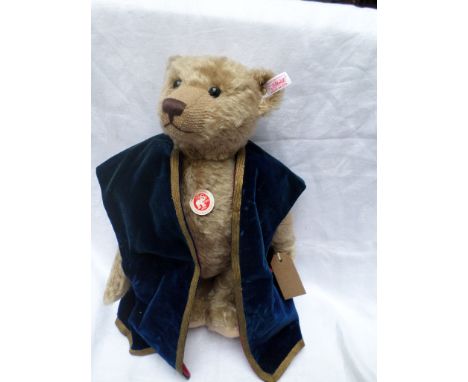 Light brown Steiff stud in the ear bear, limited edition, hump back with growler, with loose dark blue velvet waistcoat