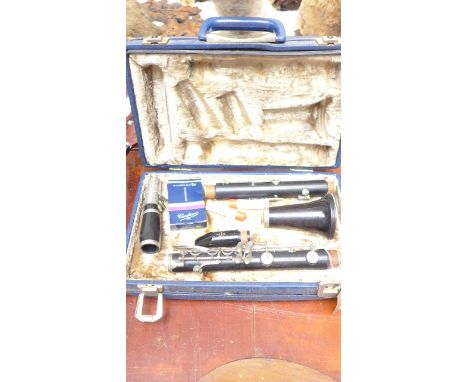 Clarinet and accessories in blue leather lined carrying case 