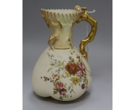 A Royal Worcester floral painted lobed jug with gilt coral handle, pattern no.1507 height 22cm