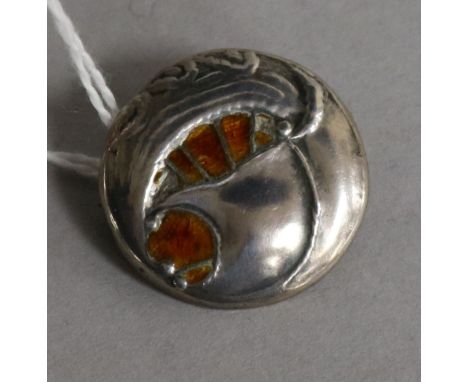 An Edwardian Art Nouveau Liberty & Co Cymric silver and enamel button, converted to a brooch, decorated with a stylised ship,