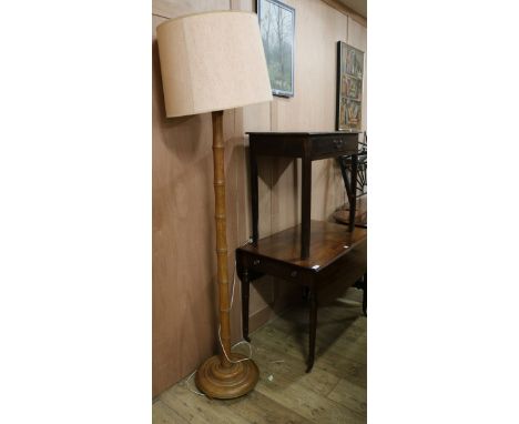 A George III oak lowboy and a simulated bamboo standard lamp table W.76cm