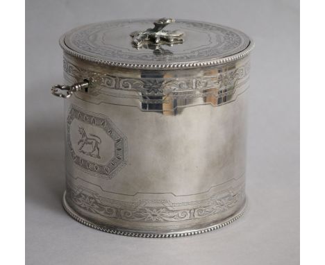 A George III engraved silver cylindrical tea caddy by Robert Jones I, London, 1774, with key, 10cm, 10 oz.