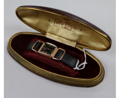 A cased stylish 14ct gold filled Lord Elgin manual wind wrist watch.