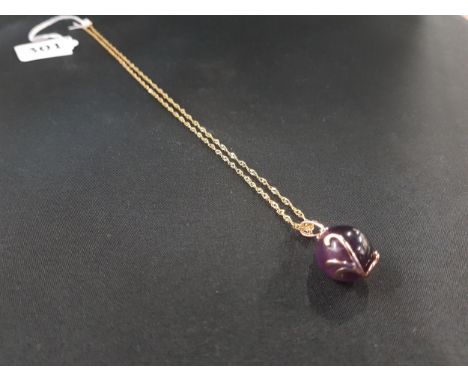 SILVER GILT AMETHYST PENDANT ON SILVER GILT CHAIN 