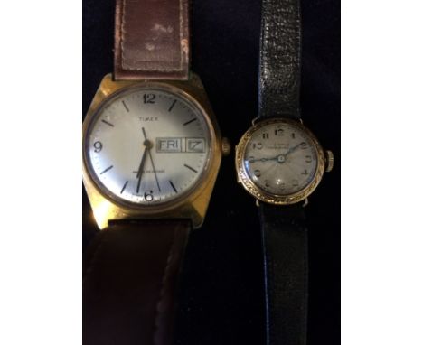 Two vintage watches a Timex and a gold faced one by A Birkle of Loughborough 