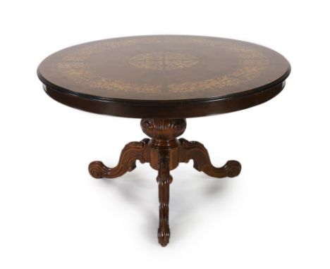 Victorian walnut and marquetry breakfast table Victorian walnut and marquetry breakfast tableThe circular tilt top inlaid wit