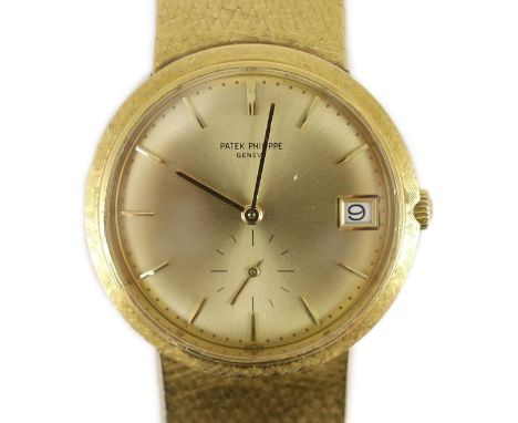 A gentleman's late 20th century 18ct gold Patek Philippe automatic dress wrist watch, on integral Patek Philippe 18ct gold br