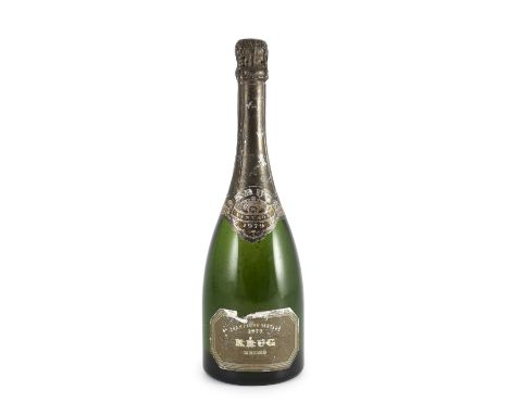 A bottle of Krug 1979 vintage champagne, 32cm highFoil around the neck a little scuffed, label scratched and scuffed, when in