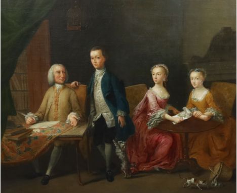 Manner of Arthur Devis (1712-1787) Family portrait, interior with a gentleman seated at a writing table, his son to one side 