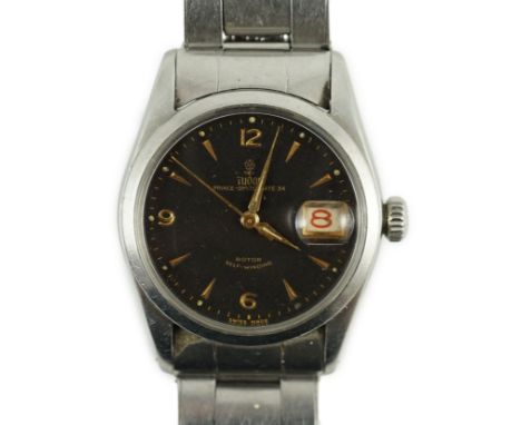 A gentleman's 1950's Tudor Prince Oysterdate 34 rotor self-winding wrist watch, with black dial, baton and quarterly Arabic n