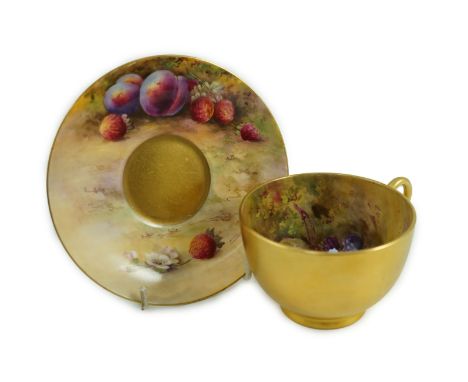 A Royal Worcester fruit painted tea cup and saucer, date code for 1925/6, the interior of the cup painted by Moseley with pea