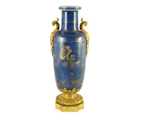 A Chinese gilt-decorated powder blue rouleau vase, Kangxi period, with French ormolu mounts, each side gilded with chrysanthe