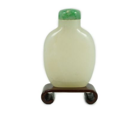 A Chinese white jade snuff bottle, 19th/20th century, of flattened high shouldered form, on an oblong shaped foot, the stone 