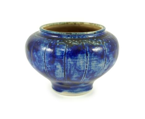 A Martin Brothers blue glazed vase, dated 1912, of squat baluster form with incised vertical lines, incised mark ‘11 1912 Mar