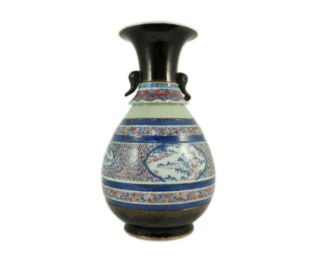 A Chinese underglaze blue and copper red vase, Xuande mark, 19th century, the brown glazed neck applied with a pair of elepha