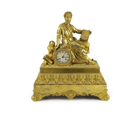 A mid 19th century French ormolu mantel clock, modelled with a seated philosopher holding a tablet inscribed Ajax Furieux, a 