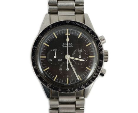 A gentleman's rare mid 1960's stainless steel Omega Speedmaster 'Ed White' manual wind chronograph wrist watch, the black dia