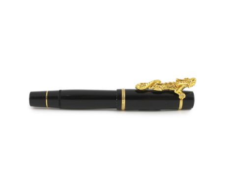 A Mont Blanc Year of the Golden Dragon fountain pen, the cap applied with a dragon holding a pearl in it's mouth, 18k gold ni