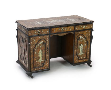 An important 18th century Lombardy ebony banded walnut and ivory inlaid twin pedestal desk, the top and sides inlaid with a s