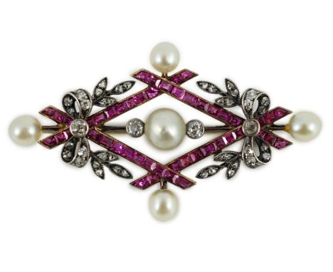 An early 20th century gold and silver, cultured pearl, ruby and diamond cluster set diamond shaped brooch, 41mm, gross 5.2 gr