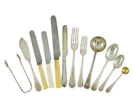 A Victorian part canteen of silver double struck Old English beaded pattern cutlery by George Adams, comprising seventy eight