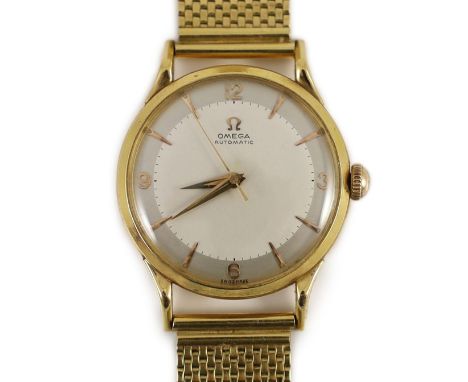 A gentleman's 1950's 18ct gold Omega Automatic wrist watch, with French 18ct gold mark, on an associated French 18ct gold bra