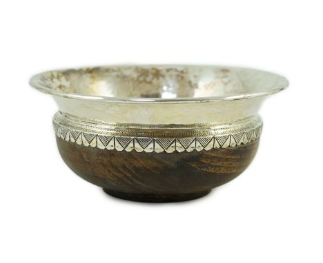 A George V Arts &amp; Crafts planished silver mounted Mazar bowl, by Albert Edward Jones, diameter 14cm, gross weight 8.5oz.S