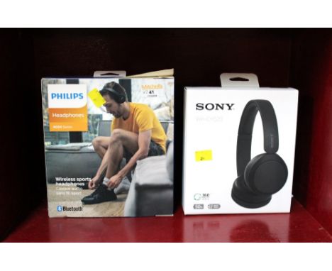 Two boxed sets of headphones by Philips 4000 series and Sony WHCH 520