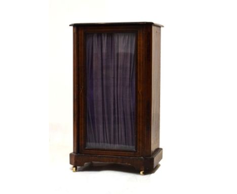 Late Victorian music cabinet with canted oblong top over glazed door with pleated fabric backing   Condition: 