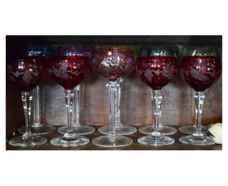 Set of six cut glass wines, each with differently coloured bowl, together with four ruby flashed similar (10)   Condition: 