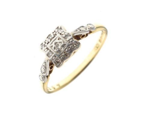 18ct and Platinum dress ring set nine diamonds in an illusion setting, size P, 2.6g gross approx   Condition: 