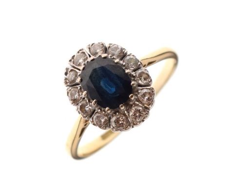 Sapphire and diamond set ring, the shank stamped 18ct and Plat, size S, 4.8g gross approx   Condition: 