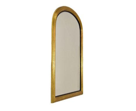 Gilt-framed overmantel or console mirror with arched bevelled plate within reeded frame, 113cm high   Condition: 