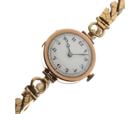Lady's 9ct gold cased wristwatch, white Arabic dial, Swiss 15-jewel manual wind movement, import mark for Glasgow 1939, to a 