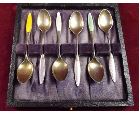 A set of six Danish silver and enamel coffee spoons, cased