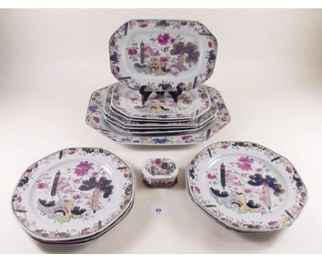 A Chinese Qianlong famille rose dessert service painted scrolls and flowers comprising: one large meat plate 38cm across, thr