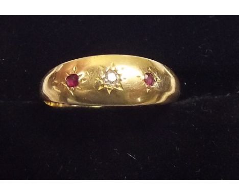 An 18ct gold ruby and diamond gypsy ring - 2.4g , size O