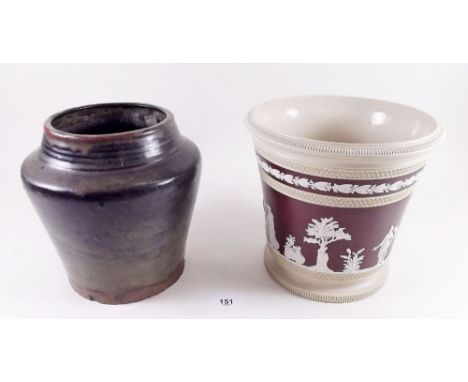 A Poole pottery studio vase with dark dribbled glaze (chipped to base) and a Copeland Jasperware style jardiniere on a brown 