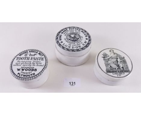 A set of three Victorian ceramic pots with lids