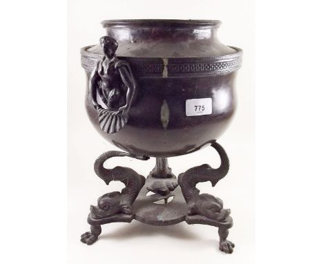 A 19th bronze urn with dolphin supports and caryatid handles - 37cm 