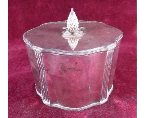 A silver tea caddy with pineapple finial to hinged lid - London 1926, 10ozs