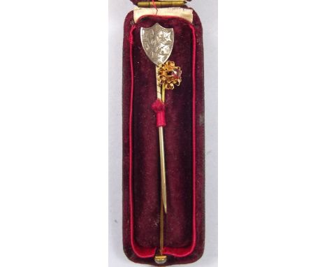 A Victorian gold and ruby stick pin and a silver stick pin in fitted box 