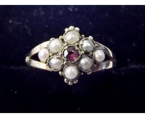 A Victorian pearl and ruby cluster ring , size N.5