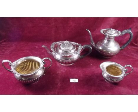 A Victorian silver well matched four piece half gadrooned tea and coffee service with foliage decoration - London 1903, 1906 