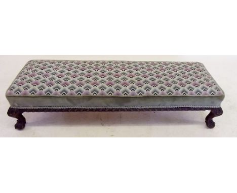 A long tapestry topped footstool 