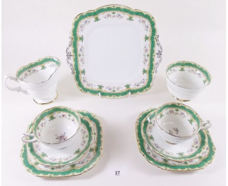 A Paragon floral tea service comprising: six cups and saucers, six tea plates, cake plates, milk and sugar 