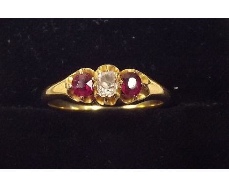 An Edwardian gold ruby and diamond ring (probably 18ct but unmarked), size M